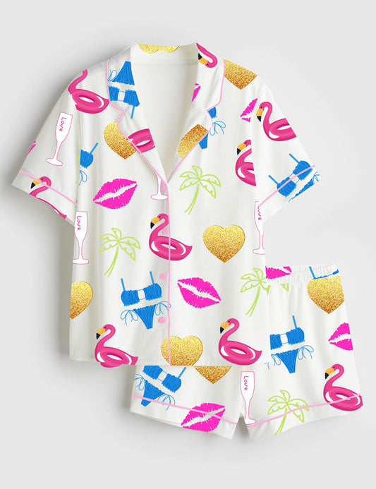 Women’s Island Pool Party Bachelorette Tropical Poolside Palm Trees Champagne Flutes Bikinis And Flamingos Print Short Sleeve Satin Pajama Set