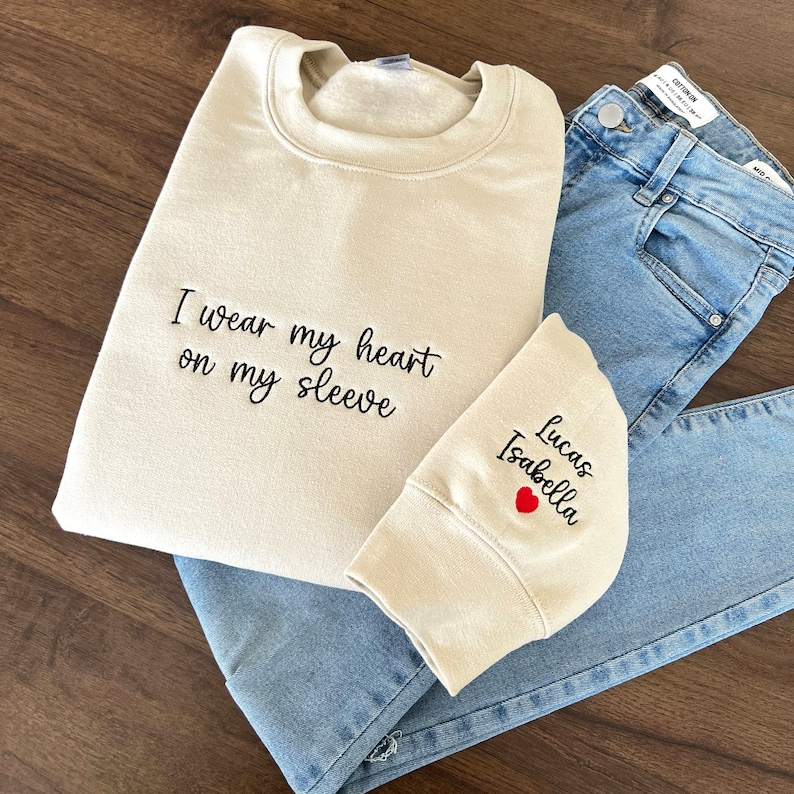 I Wear My Heart On My Sleeve, Embroidered Custom Mama Shirt With Kids Names, Pregnancy Reveal Hoodie Gift For New Mom, Mother's Day Gift