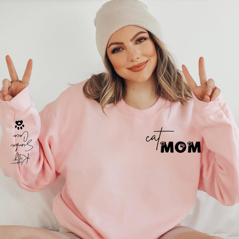 Custom Cat Mom Sweatshirt With Pets Names On Sleeve, Personalized Cat Mama Hoodie, Cat Lover Outfit, Mom Of Cat Clothing, Mothers Day Gifts