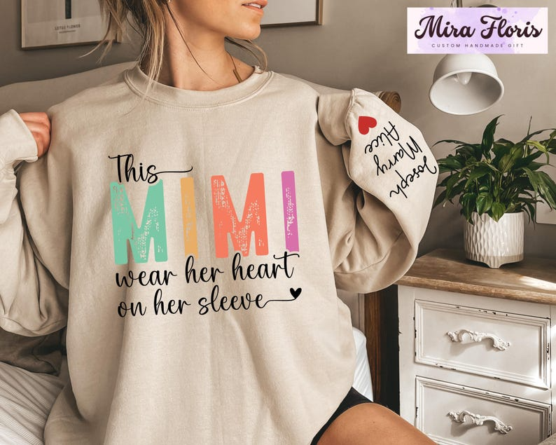 This Mimi Wear Her Heart On Her Sleeve Mimi Sweatshirt, Custom Mimi Sweatshirt With Kids Name, Nana Gift Hoodie, Kids Name on Sleeve