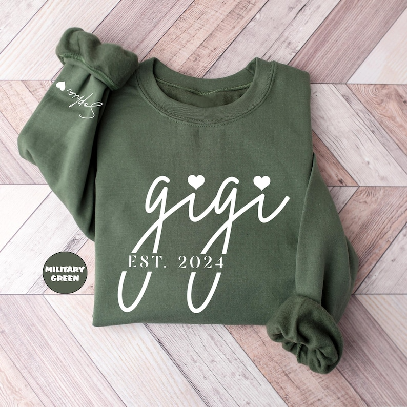 Custom Gigi Sweatshirt With Grandkids Names On Sleeve, Personalized New Grandma Hoodie, Pregnancy Reveal Granny Outfit, Grammy Clothing Gift