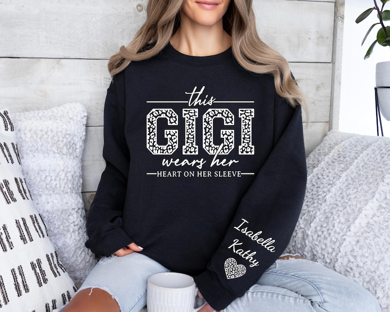 Custom Gigi Sweatshirt,Custom Grandma Gift, This Gigi Wears Her Heart On Her Sleeve Sweater,With Kids Name On Sleeve, Gigi Sweater,Gigi Gift