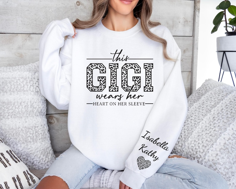 Custom Gigi Sweatshirt,Custom Grandma Gift, This Gigi Wears Her Heart On Her Sleeve Sweater,With Kids Name On Sleeve, Gigi Sweater,Gigi Gift