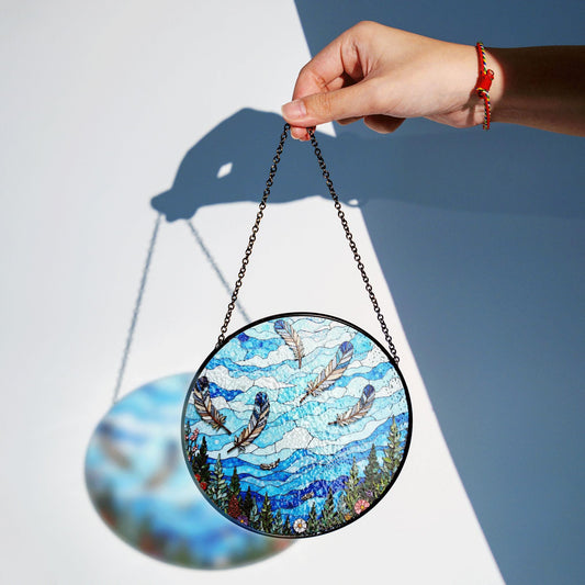 drifting feathers in mountain sky blue stained glass suncatcher gift for nature lovers