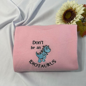 Don't be an Idiotaurus embroidered sweatshirt; Funny Dinosaur embroidered crewneck.